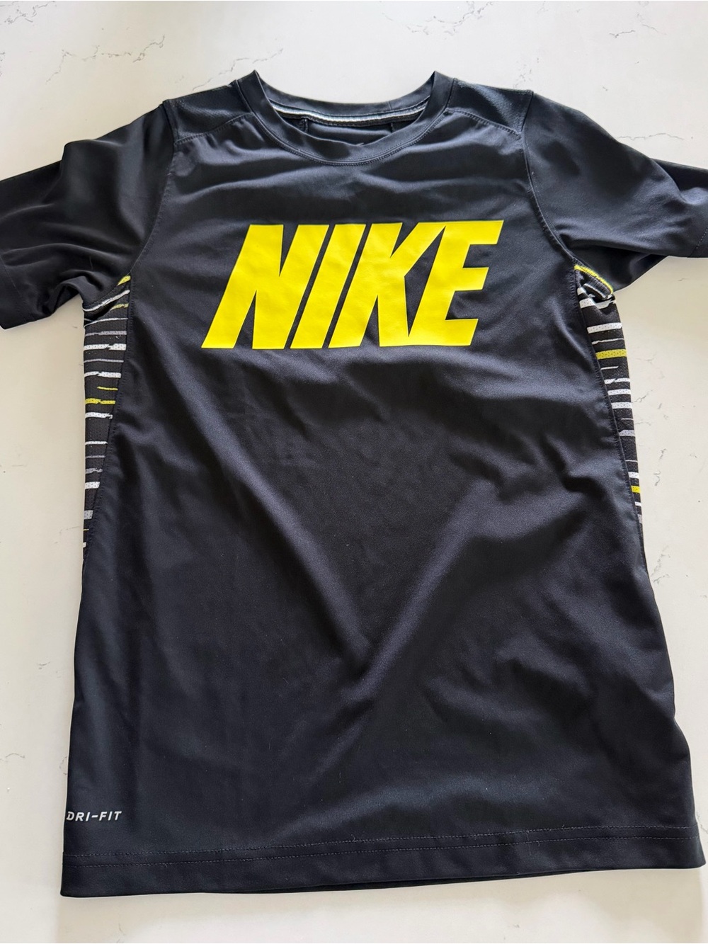 Nike Black Tee with Bold Yellow Logo for Kids